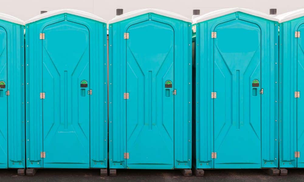 How To Class Up an Outdoor Wedding With a Porta Potty
